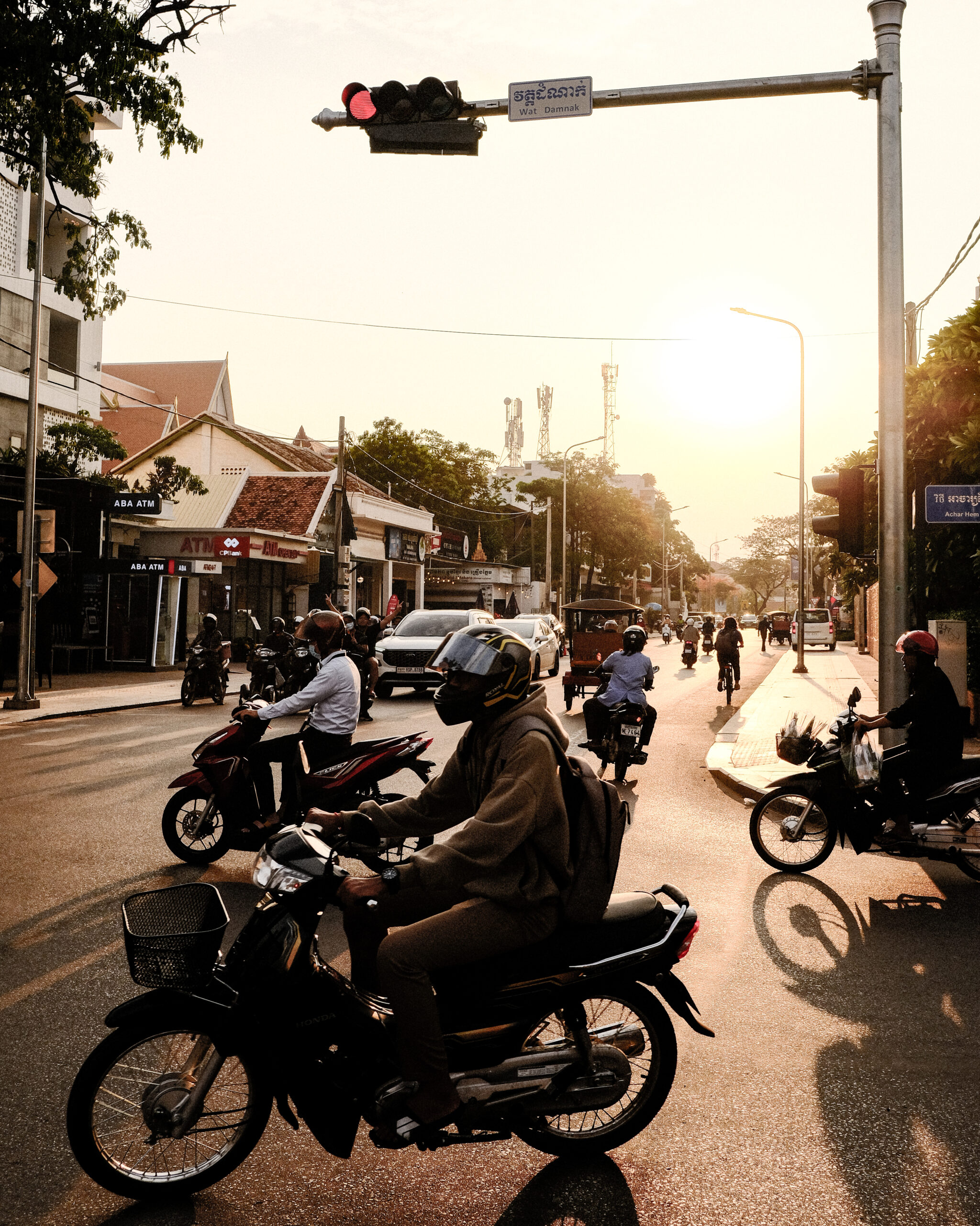 Motorbikes on a busy street in Siem Reap, Cambodia
